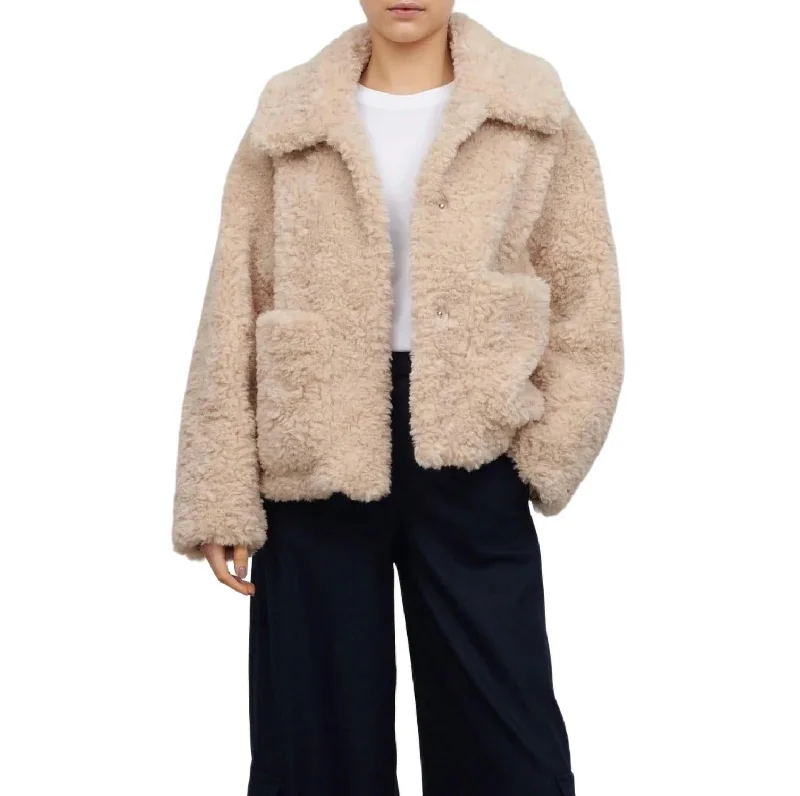 Traci Cropped Curly Faux Fur Jacket In Biscuit